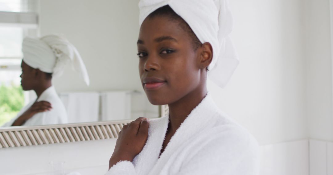 Woman Relaxing in Bathrobe and Towel in White Bathroom - Free Images, Stock Photos and Pictures on Pikwizard.com