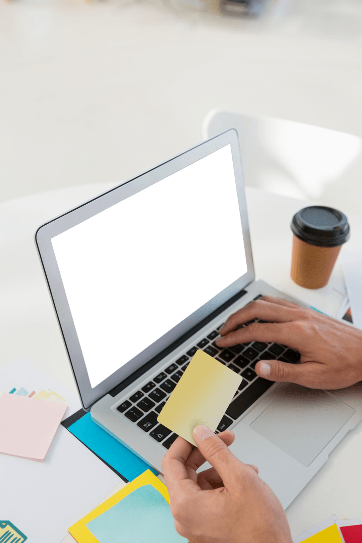 Designer Hands Holding Note at Laptop Desk with Transparent Inspiration