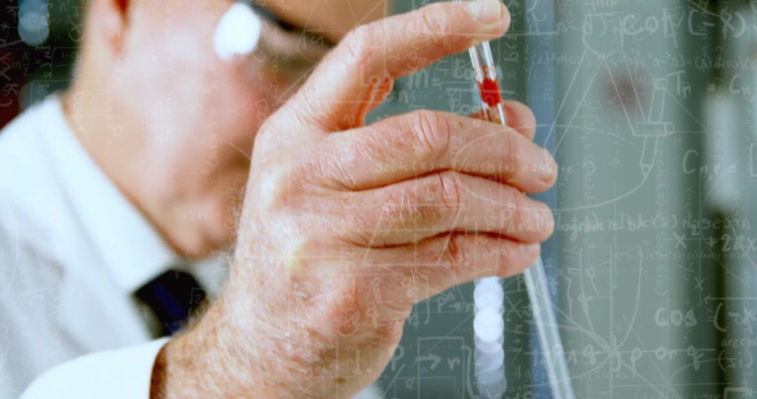 Focused Scientist Conducting Laboratory Experiment with Pipette