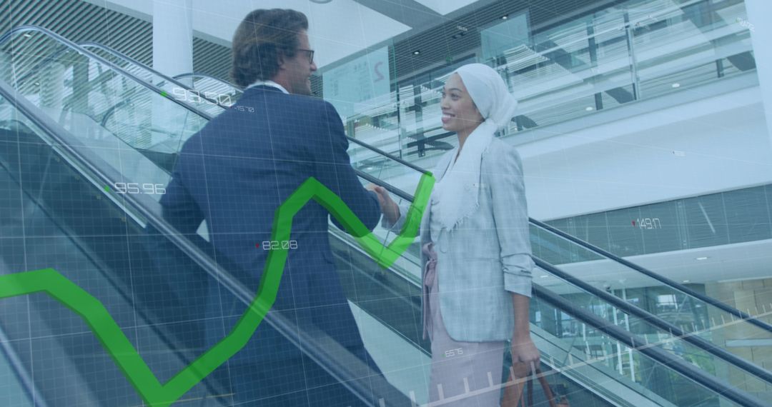 Diverse Businesspeople Sharing Insights with Financial Graph Overlay