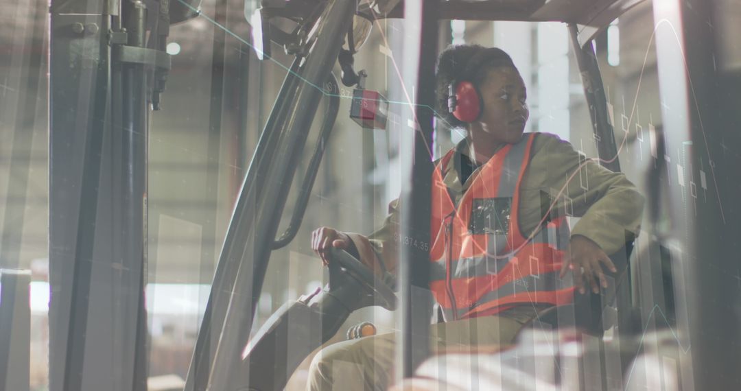 Warehouse Operator Analyzing Data on Forklift in Logistics Hub