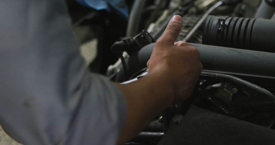 Mechanic Working on Car Engine in Auto Repair Shop - Free Images, Stock Photos and Pictures on Pikwizard.com