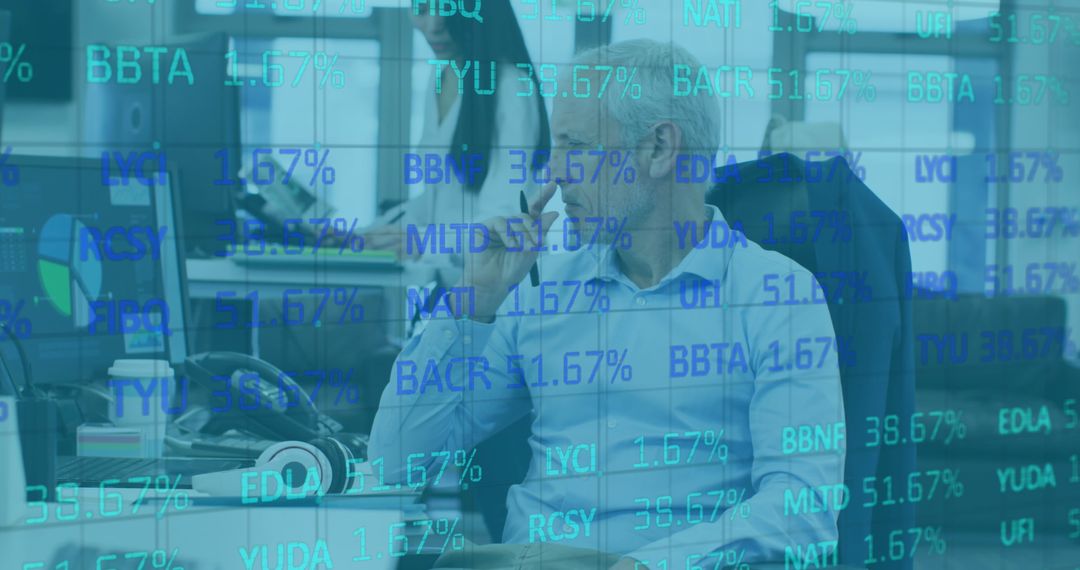 Business Professional Analyzing Financial Data on Transparent Interface