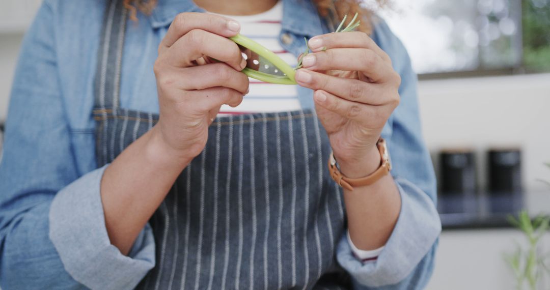 Close-Up of Woman Preparing Fresh Herbs in Modern Kitchen - Free Images, Stock Photos and Pictures on Pikwizard.com