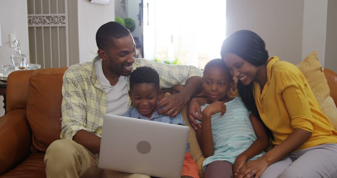 Happy Family Enjoying Video Call Together at Home