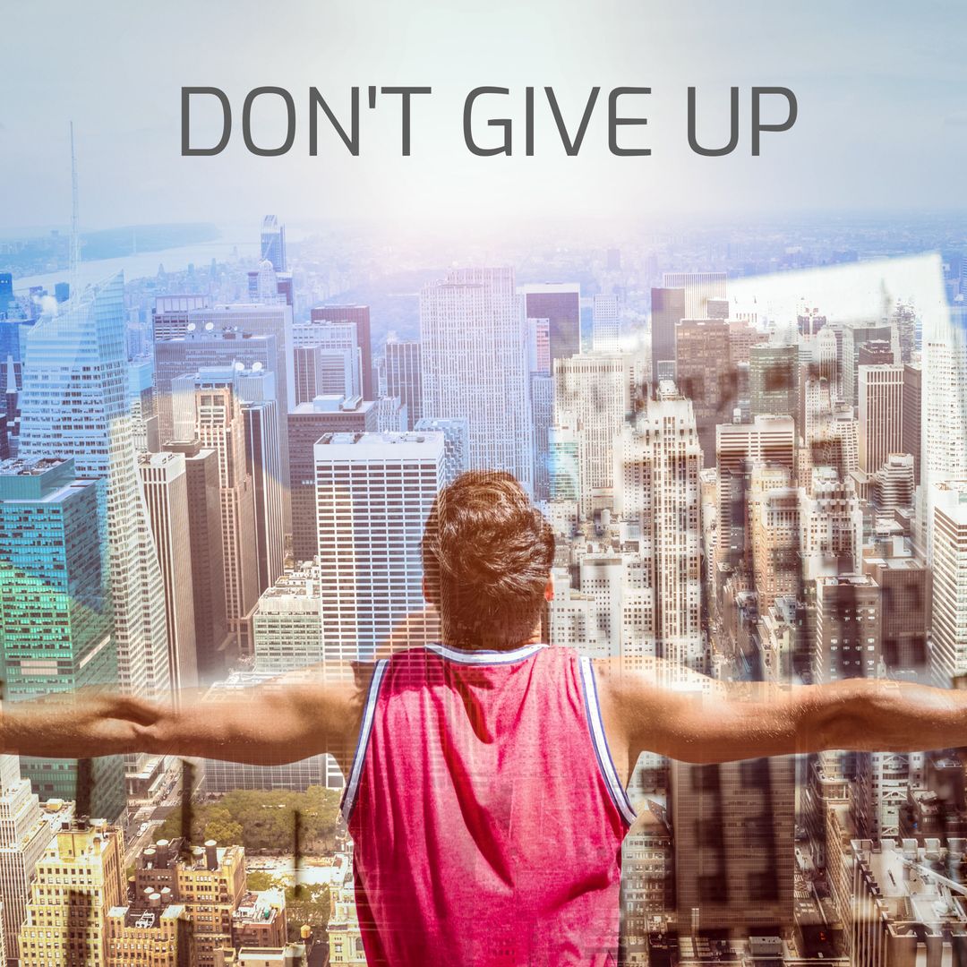 Person Overlooking Cityscape with Motivational Message