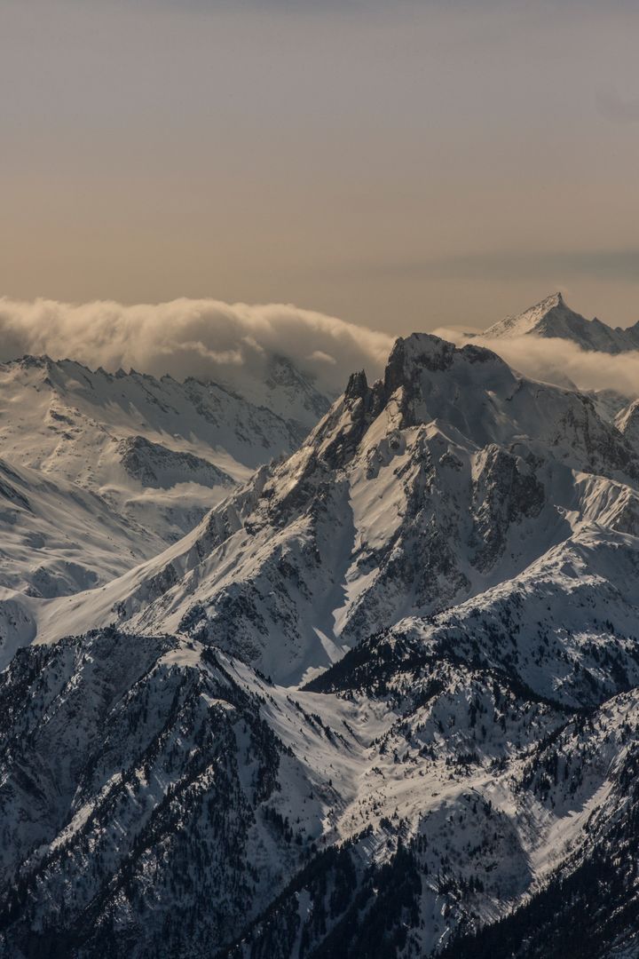 Snow-Capped Mountain Peaks at Sunrise - Free Images, Stock Photos and Pictures on Pikwizard.com