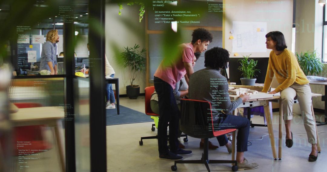 Team Collaborating on Prototype in Modern Office