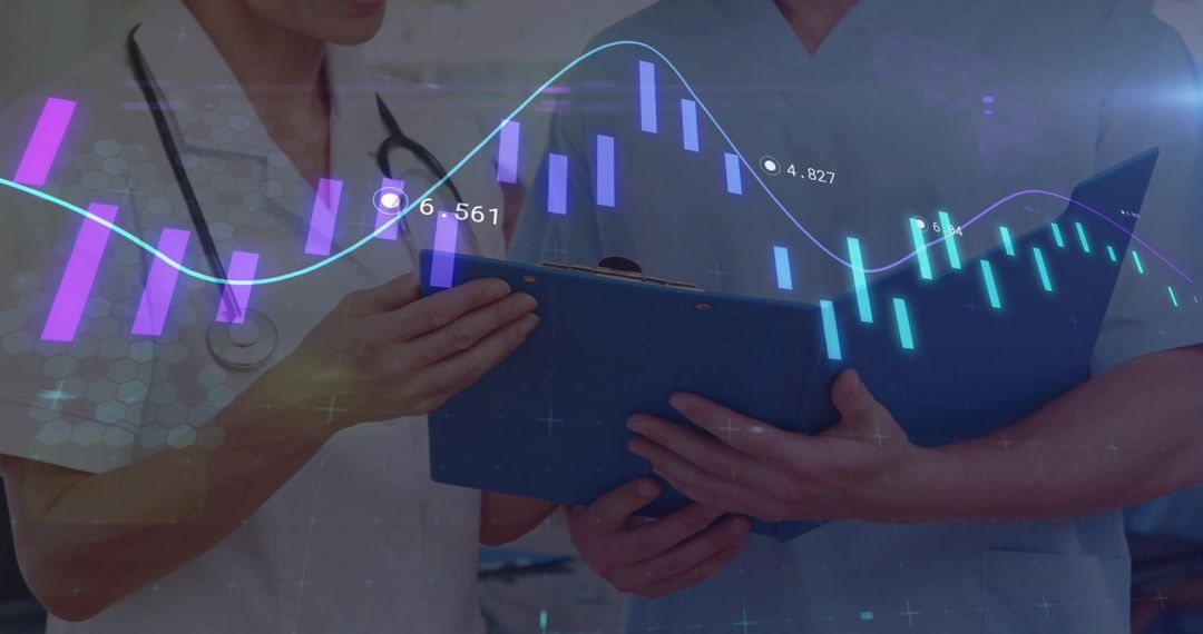 Doctors Analyzing Data with Digital Graphs in Medical Setting