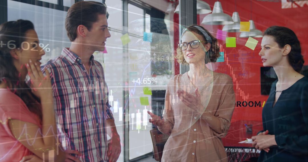 Diverse Team Collaborating in Office Surrounded by Financial Data