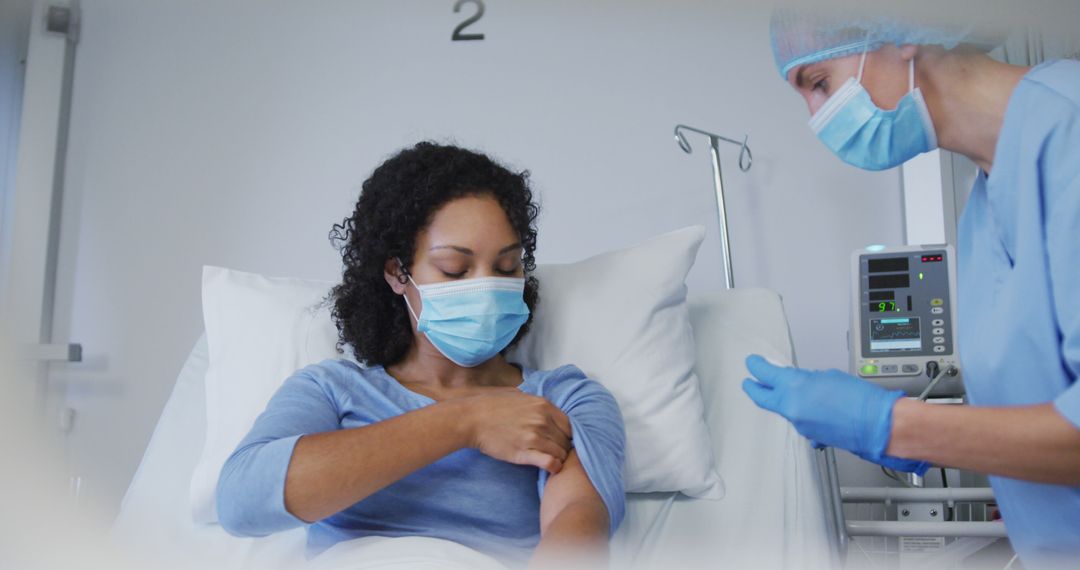 Medical Professional Administering Vaccine to Smiling Patient in Hospital - Free Images, Stock Photos and Pictures on Pikwizard.com