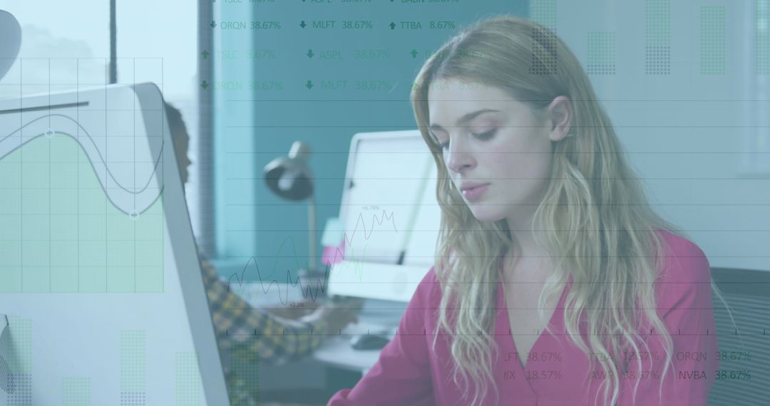 Businesswoman Analyzing Data on Computer with Graph Overlay