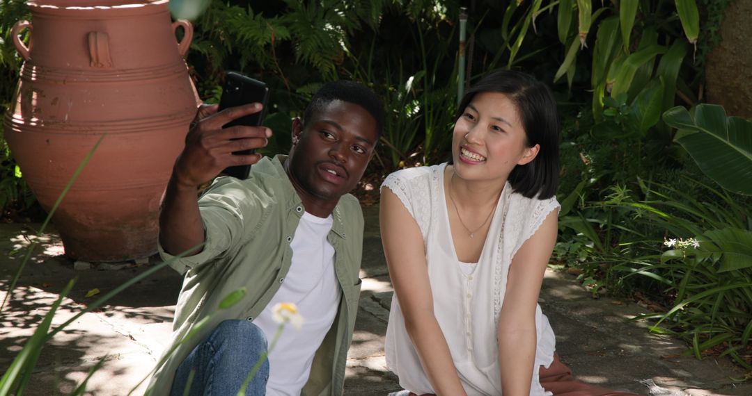 Friends Enjoying Time Together in Lush Garden