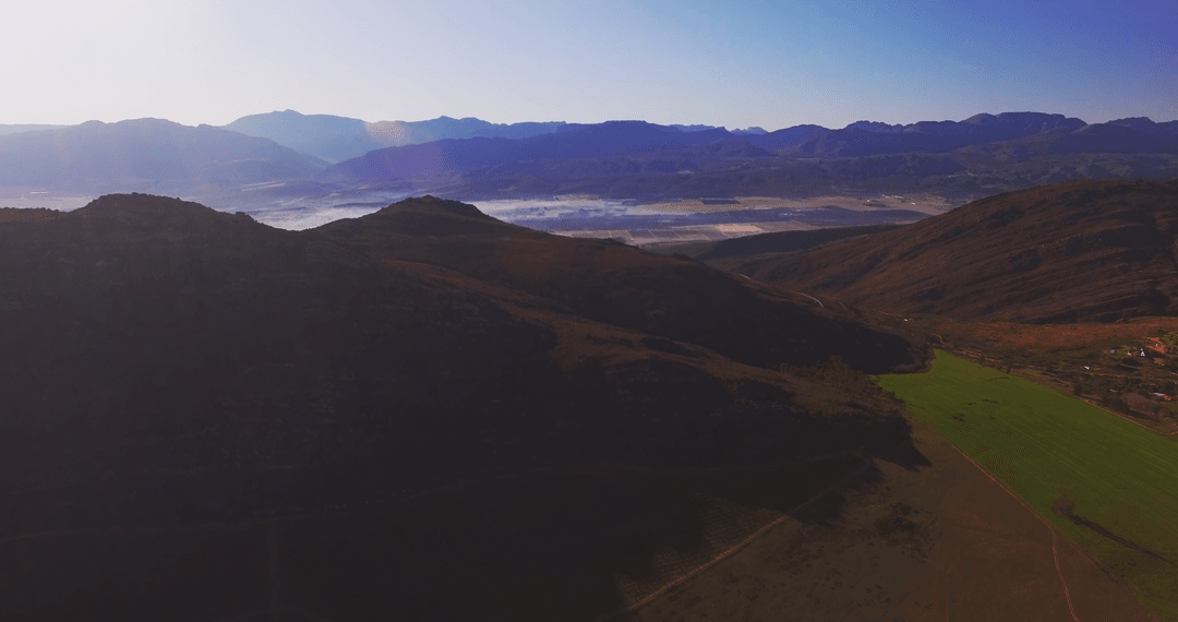 Panoramic Cloud-Covered Mountain Landscape with Transparent Sky Effect