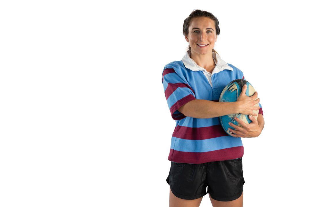 Portrait of happy female player holding rugby ball - Free Images, Stock Photos and Pictures on Pikwizard.com
