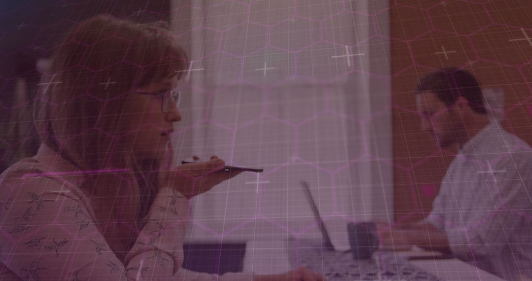 Businesswoman Utilizing Technology in Modern Office Setting