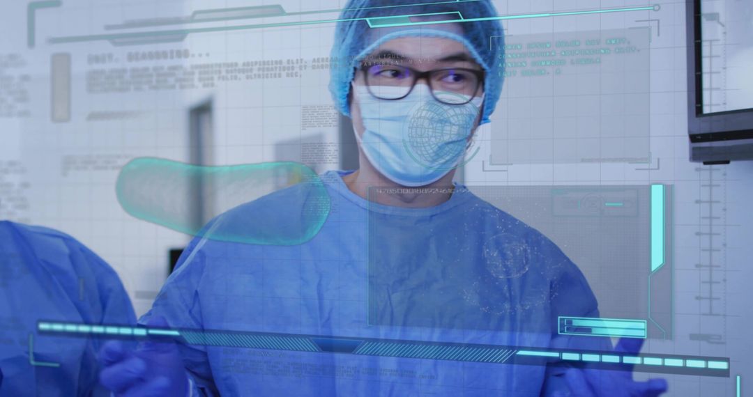 Surgeon wearing PPE studying augmented reality holographic surgical display in operating room