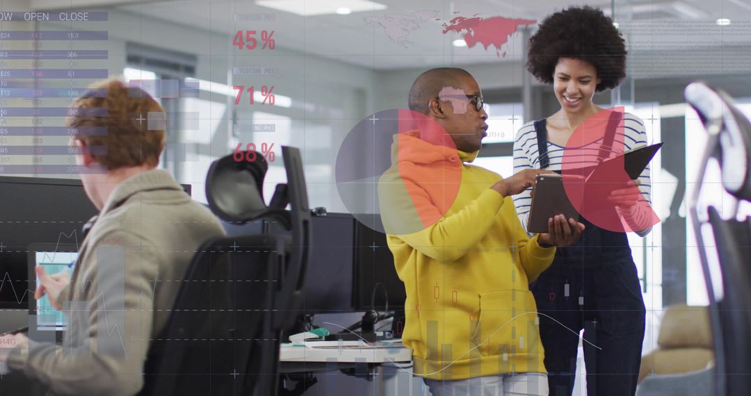 Diverse Team Analyzing Digital Data in Modern Office Space