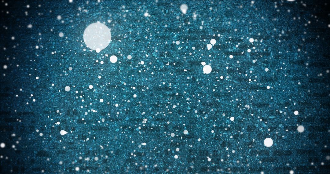 Falling Snow on Blue Background Reflects Winter Magic