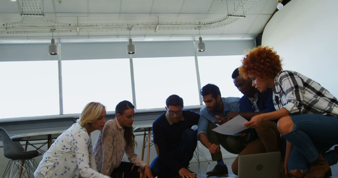 Diverse Team Engaged in Collaborative Brainstorming Session