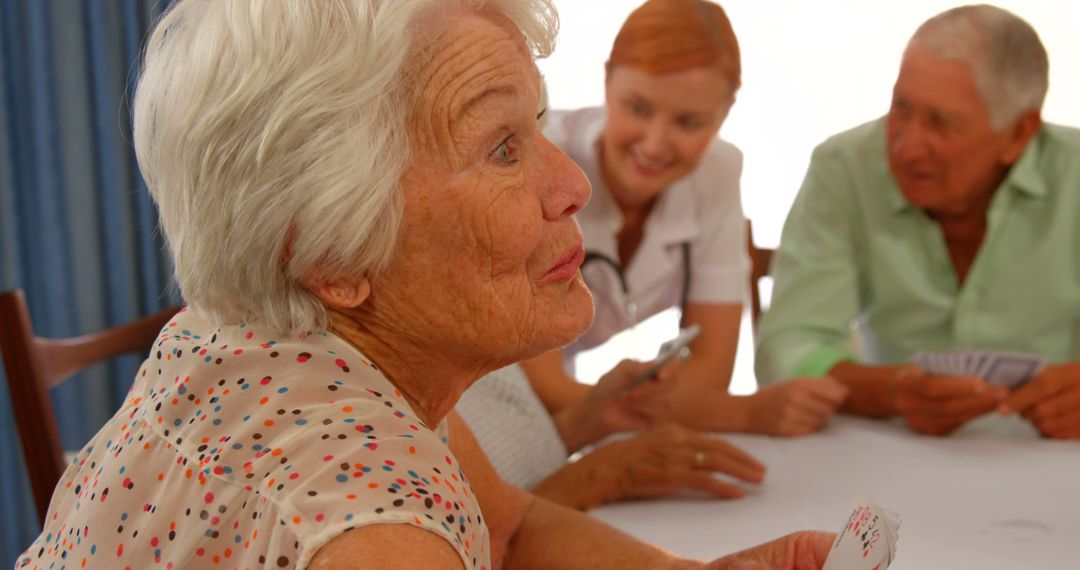 Happy Senior Community Playing Cards Together - Free Images, Stock Photos and Pictures on Pikwizard.com