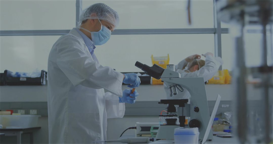 Scientist Conducting Research with Microscope in Laboratory