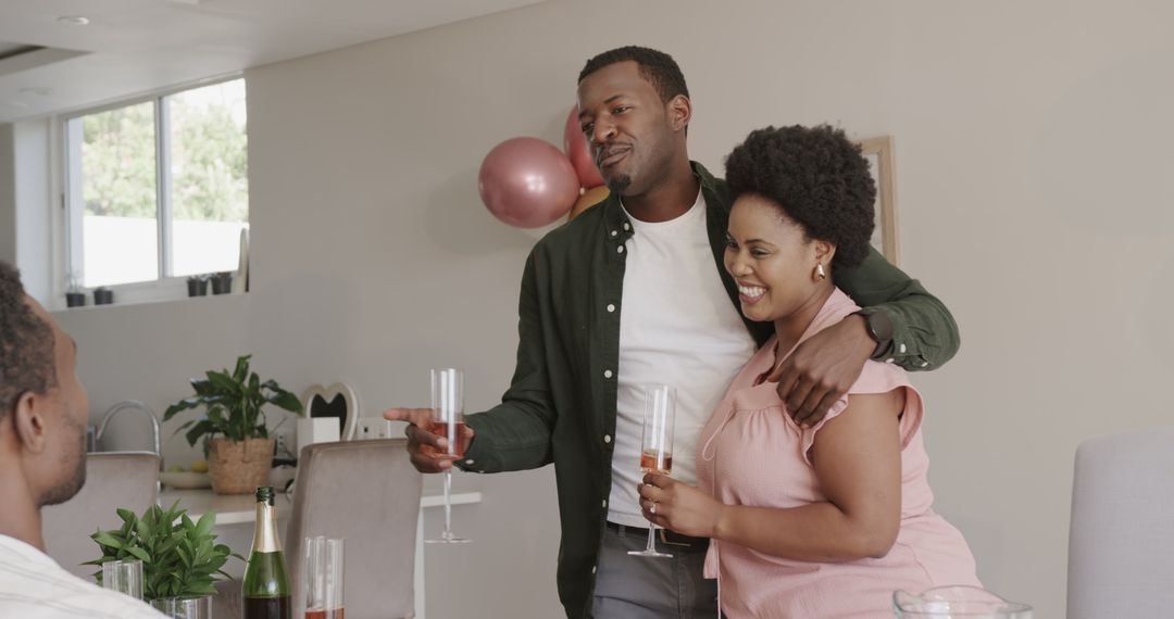 Cheerful Couple Relishing Festive Toast at Home