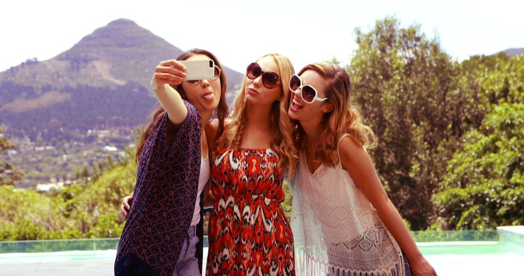 Group of Young Women Taking Selfie Outdoors in Summer - Free Images, Stock Photos and Pictures on Pikwizard.com