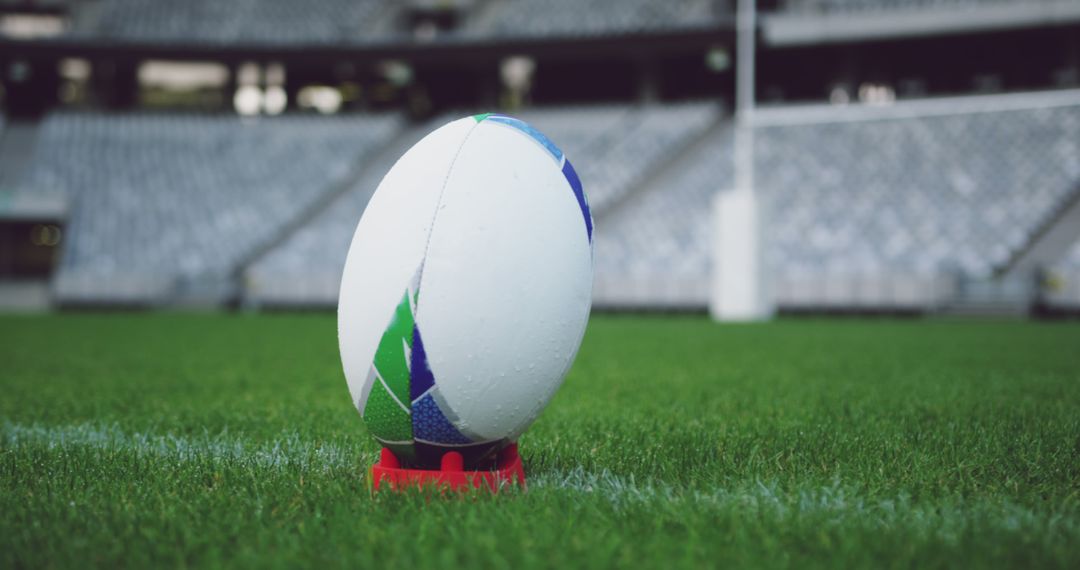 Close-Up of Rugby Ball on Kicking Tee in Empty Stadium - Free Images, Stock Photos and Pictures on Pikwizard.com