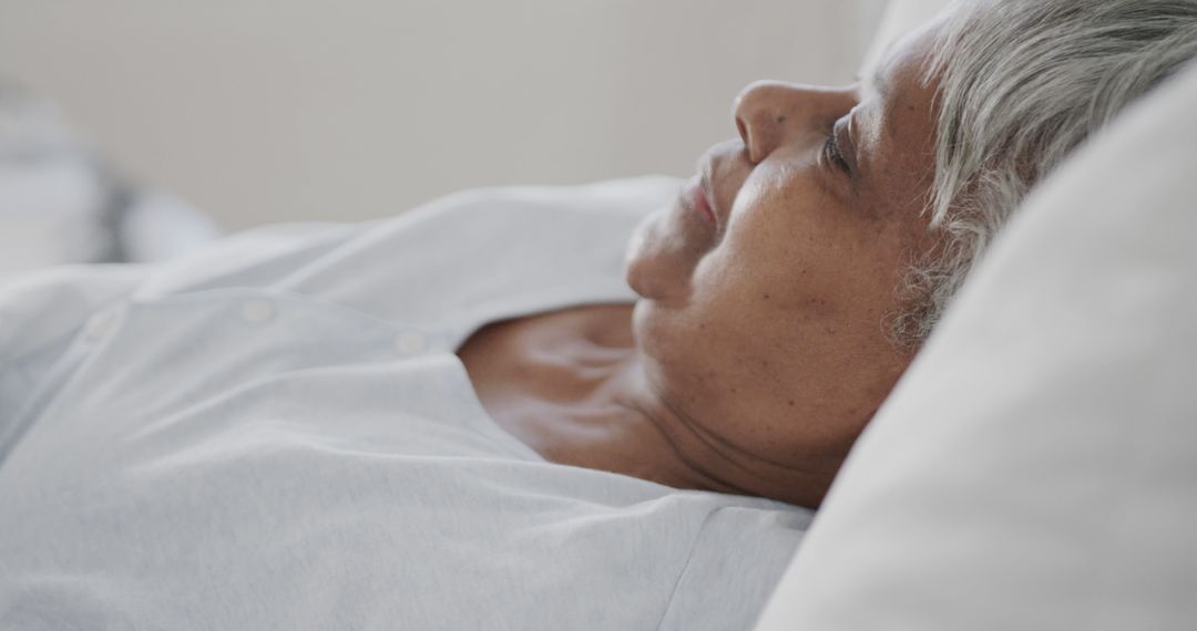 Senior African American Woman Resting in Hospital Bed - Free Images, Stock Photos and Pictures on Pikwizard.com