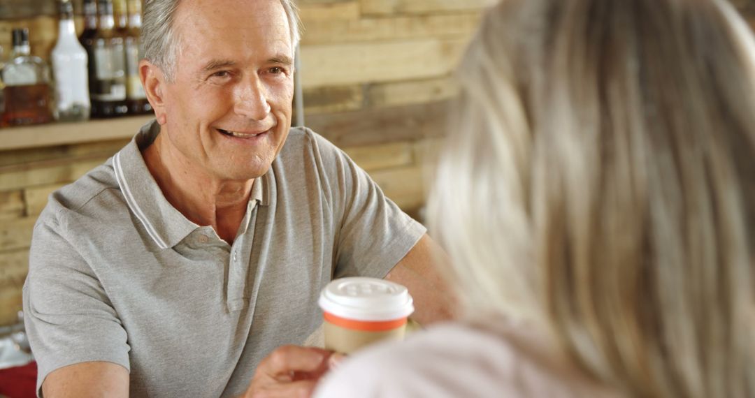 Senior Couple Enjoying Coffee at Cozy Cafe - Free Images, Stock Photos and Pictures on Pikwizard.com