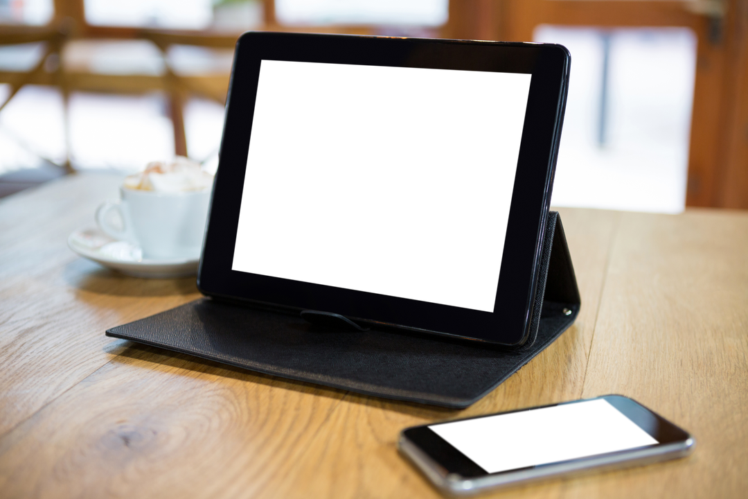 Digital Tablet and Smartphone on Cafe Table with Natural Light - Download Free Stock Images Pikwizard.com