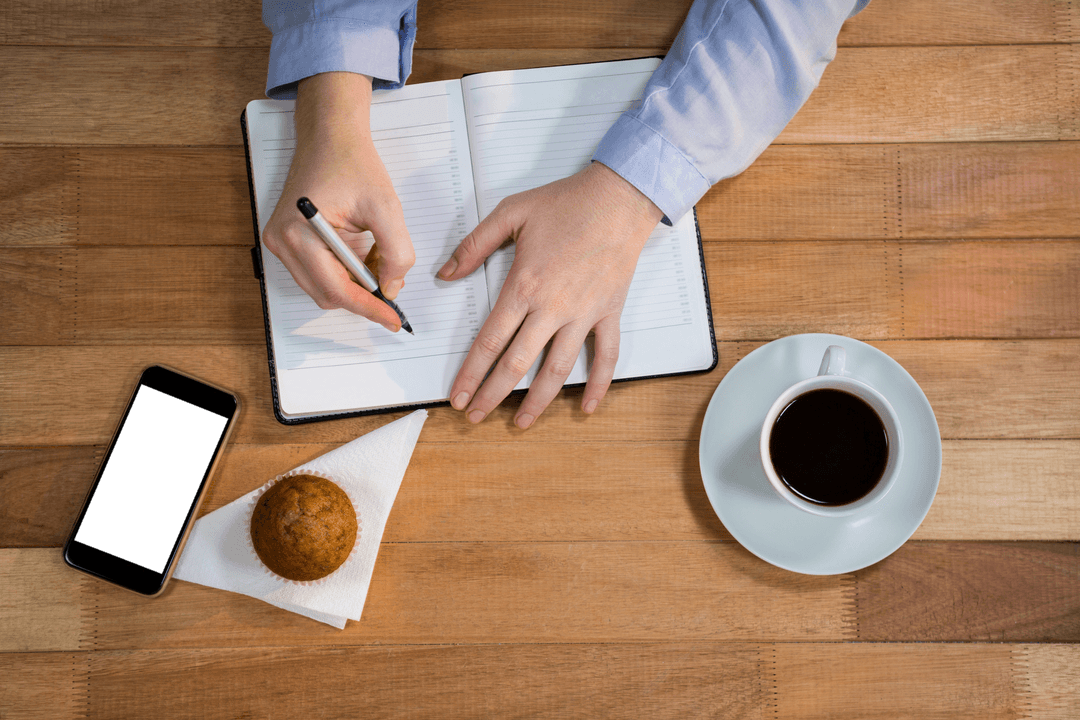 Transparent Desk: Organizer, Coffee, Muffin on Wood Surface