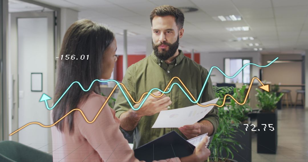 Business Colleagues Discussing Data with Graph Overlay in Office