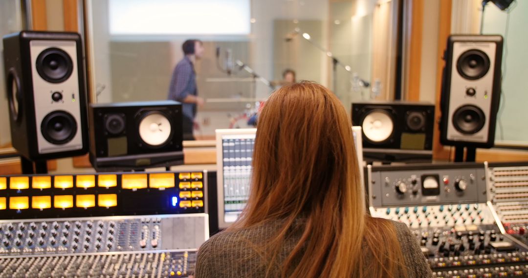 Sound Engineer Recording Music in Professional Studio - Free Images, Stock Photos and Pictures on Pikwizard.com