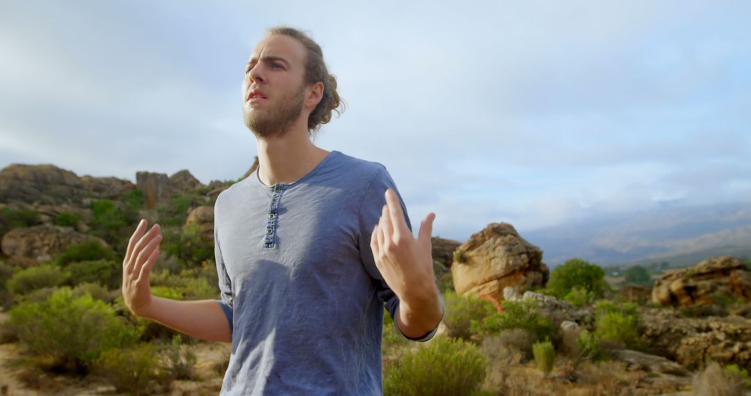 Man Enjoying Nature Outdoors in Scenic Mountain Landscape - Free Images, Stock Photos and Pictures on Pikwizard.com