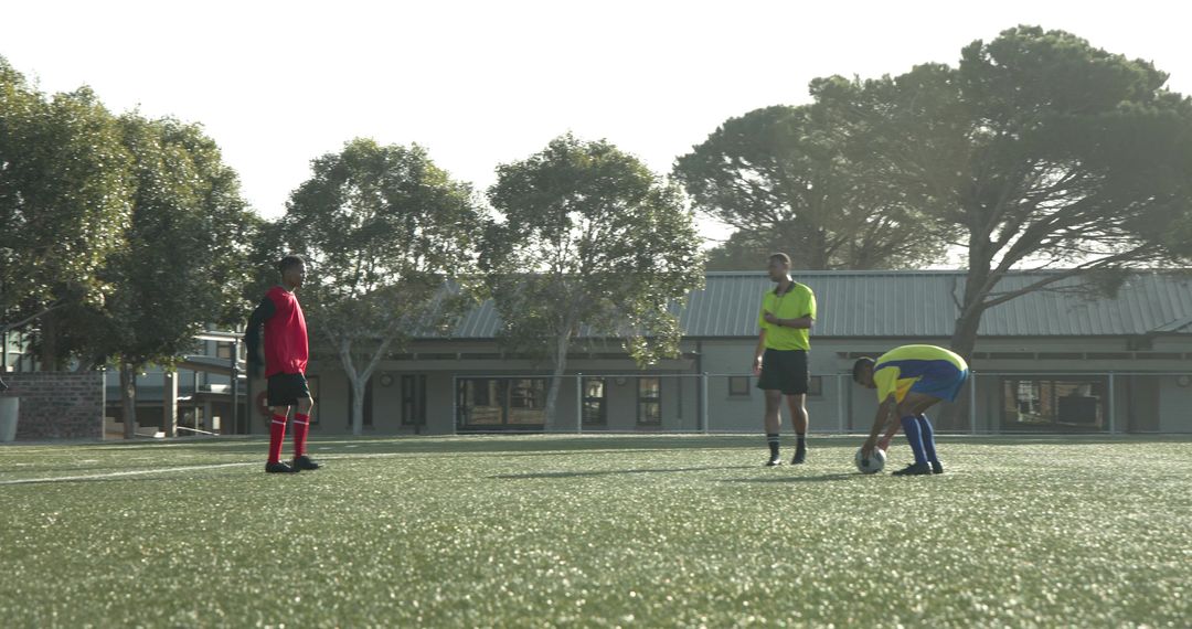 Soccer Players Preparing Match on Sunny Day