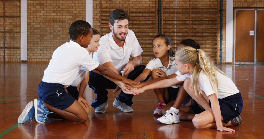 Coach Encouraging Team Huddle in Gym - Free Images, Stock Photos and Pictures on Pikwizard.com