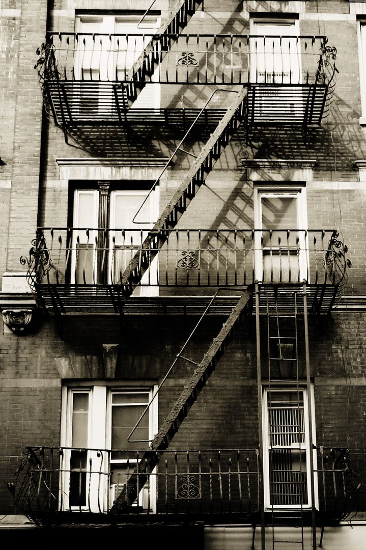 Vintage Fire Escape on Historic Urban Building - Free Images, Stock Photos and Pictures on Pikwizard.com