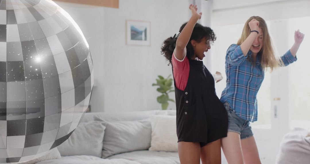 Teenagers Dancing with Disco Ball Having Fun Weekend at Home