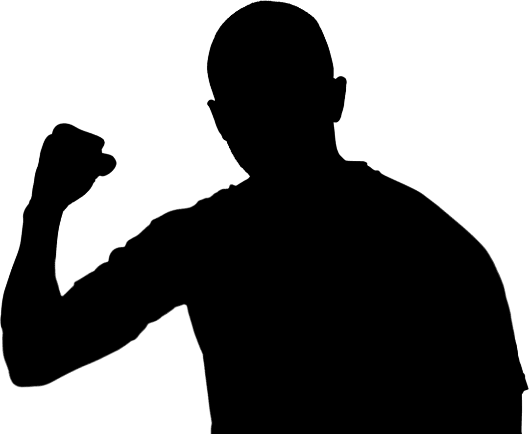 Silhouette of Triumphant Athlete with Fist Clenched