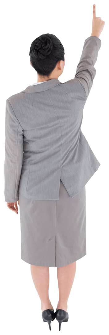Transparent Image of Businesswoman Pointing Upward Back View