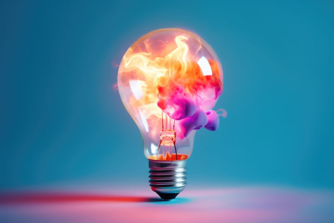 Light bulb with colour explosion on blue background, created using generative ai technology - Free Images, Stock Photos and Pictures on Pikwizard.com