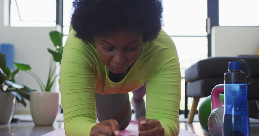 African American Woman Doing Plank Exercise at Home - Free Images, Stock Photos and Pictures on Pikwizard.com