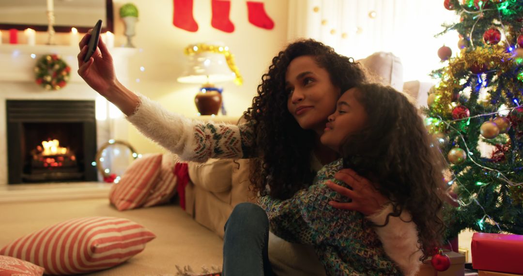 Mother and Daughter Taking Holiday Selfie at Home - Free Images, Stock Photos and Pictures on Pikwizard.com