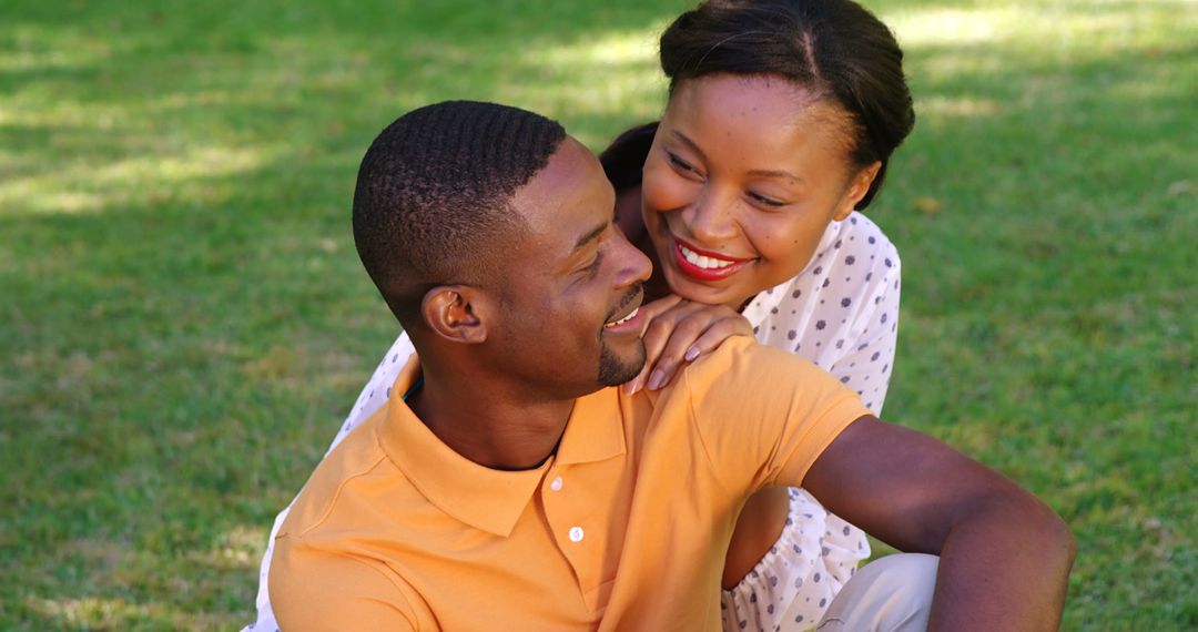 A young African American couple enjoys a romantic moment outdoors, with copy space - Free Images, Stock Photos and Pictures on Pikwizard.com