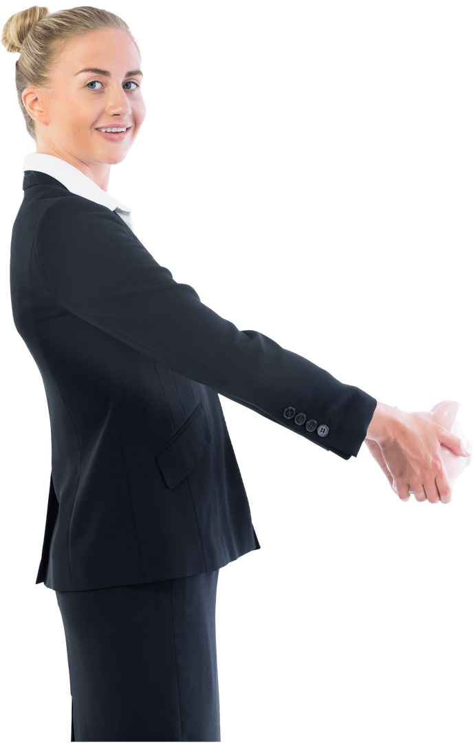 Smiling Businesswoman Holding Transparent Piggy Bank Out