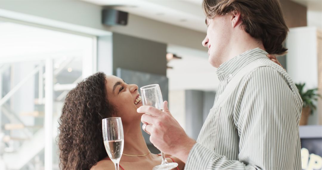 Couple Celebrating Anniversary with Champagne Toast