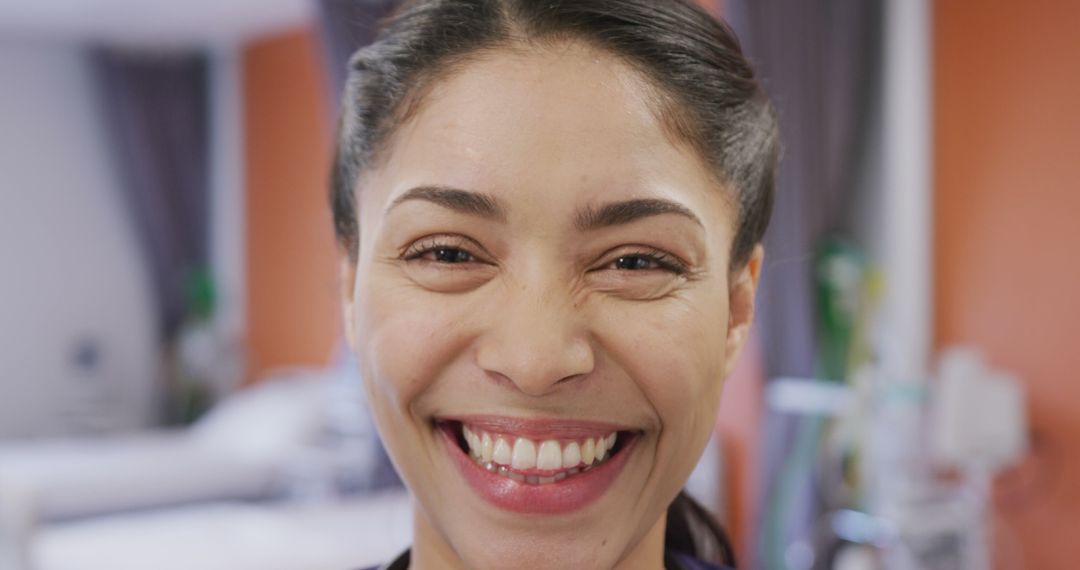 Smiling Woman in Modern Clinic Environment - Free Images, Stock Photos and Pictures on Pikwizard.com