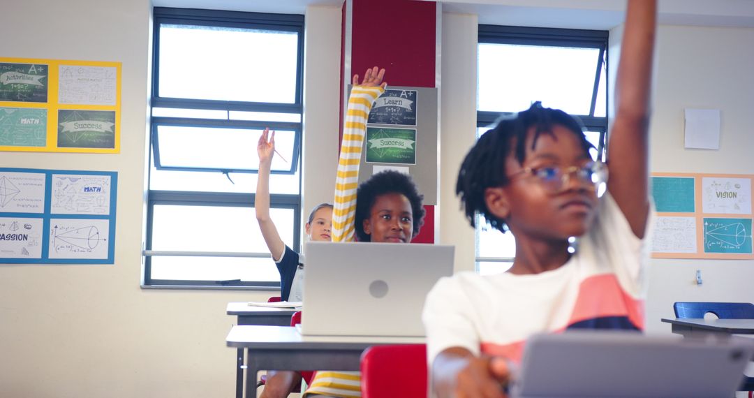 Diverse Students Using Laptops in Classroom Learning Environment